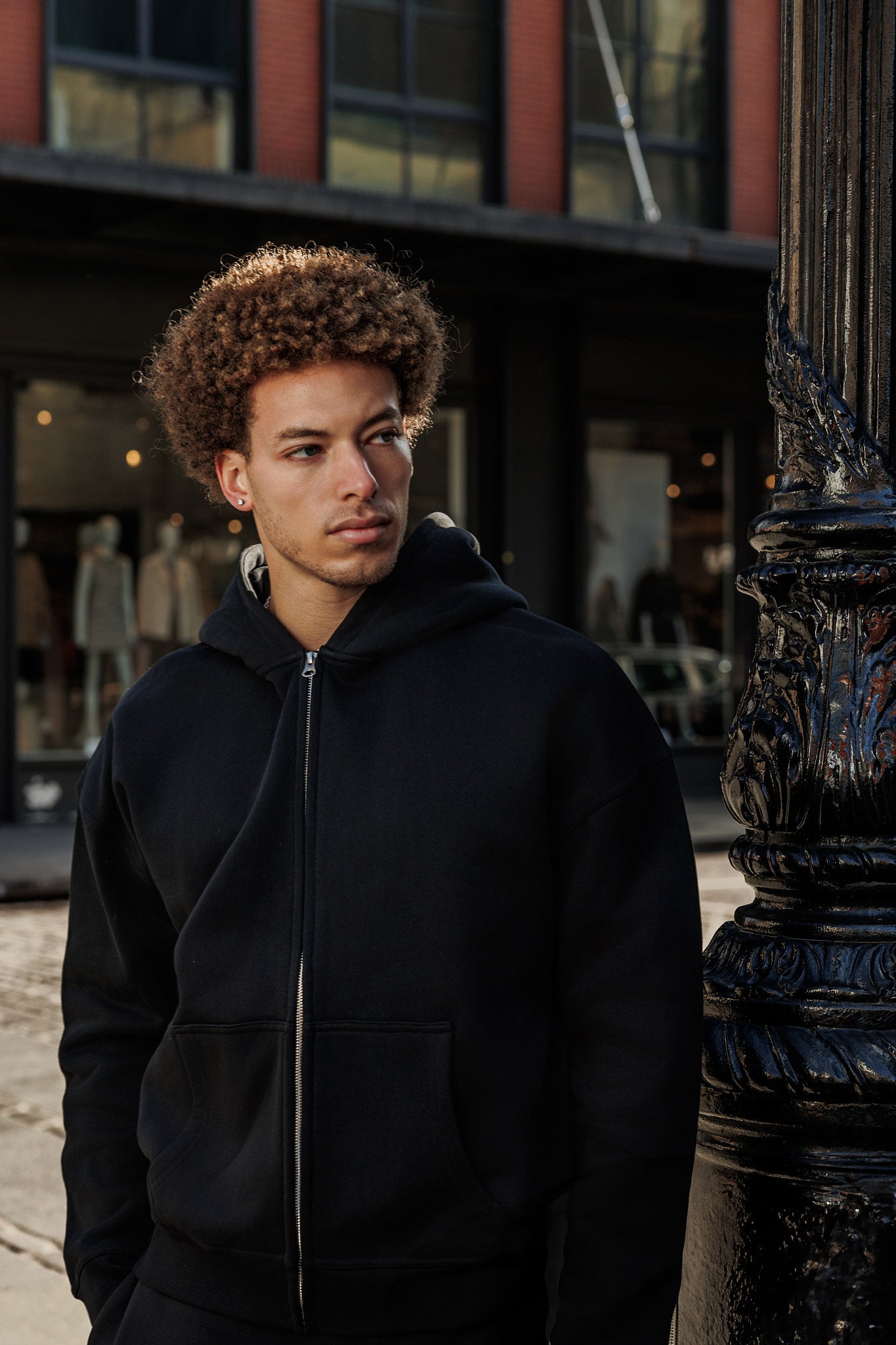 Heavyweight Black Cotton Zip Up Hoodie. Premium recycled fabrics. Wholesale Manufacturing. 